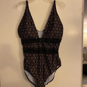 Plunge one piece bathing suit